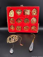 Full lot view showing Twelve Days Of Christmas ornament set, swan ornament and crystal drop