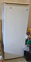 Full front view of white Danby Designer upright freezer