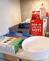 All items grouped: popcorn maker box, bowl, storage basket, jars, wrap, bags, napkins