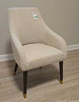 Front view of beige bouclé accent chair