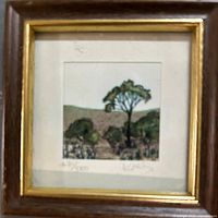 Framed square print with tree landscape, showing pencil numbering and signature