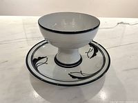 Bowl on plate showing design and scale