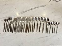 All 27 pieces arranged side-by-side