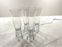 Four Iittala Arkipelago beer glasses front view