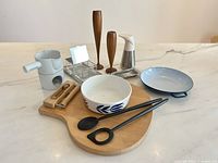 Group shot of all ten mid-century kitchen items on countertop