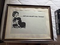 Front view of framed Peanuts cartoon print showing artwork, mat, and frame.