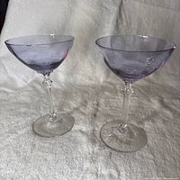 Two matching alexandrite cocktail coupes showing bowl and stems