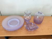 Entire lot showing plates, two vases, leaf dish