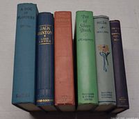 Spine view of all six clothbound books