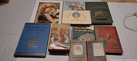 Overview of nine books and one Shirley Temple photo