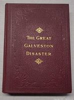 Front cover showing maroon cloth boards, gilt title, embossed border