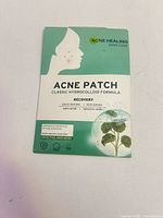 Front of Acne Healing acne patch box showing product name and graphics