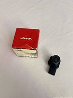 Sensor beside branded box, top view