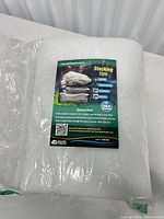 Front view of sealed bag containing Aquatic Experts polyester filter pad sheet
