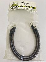 Front view of sealed package showing pair of cables and NAMZ header card