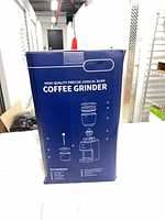 Rear of BD-CG015 coffee grinder box detailing parts and specifications