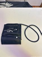 Front view of the cuff showing model marking, tube and connector