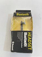 Headset in original box showing product and packaging condition