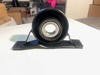 Front view of carrier bearing mounted in flanged bracket