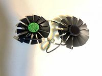 Front view of two connected cooling fans showing blade design, hub caps, wiring and mounting tabs