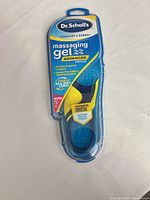 Front view of sealed Dr. Scholl's Massaging Gel Advanced insoles packaging