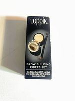 Front view of Toppik Brow Building Fibers Set box