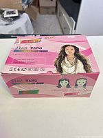 Front angled view of boxed Jian Wang JF-888-10 electric hair roller set