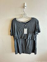 Front view showing style, color, and attached tag