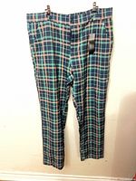 Front view hanging, showing full length, plaid pattern, tags attached