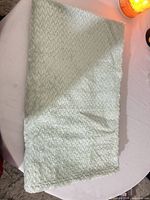 Blanket unfolded showing overall texture and color