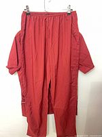 Elastic-waist red pants displayed