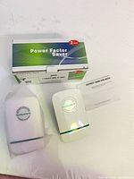 Retail box, one module in plastic sleeve, one module unwrapped, instruction sheet visible