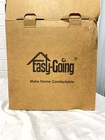 Cardboard box showing Easy-Going branding and slogan