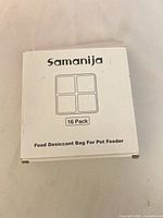 Front of unopened Samanija 16 Pack Food Desiccant Bag For Pet Feeder box