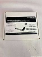 Retail box front displaying StarTech.com PEX4SFF8643 adapter details