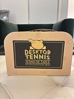 Closed carry case with Desktop Tennis label