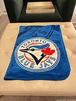 Blanket laid flat showing full Toronto Blue Jays logo