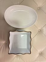 Top view of oval and square white ceramic dishes