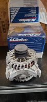 Alternator in front of original ACDelco box