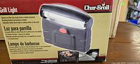 Front of boxed Char-Broil grill light