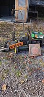 Overall lot with mower, chainsaw, spreader, art kit