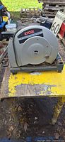 Front view of Ryobi 14-in cut-off saw on workbench