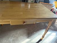 entire table showing drawer and legs