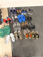 Full layout of all shoes on floor