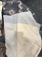 Colour-block cashmere wrap and patterned scarf