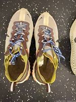 Top view Nike React shoes showing upper, laces, colorway