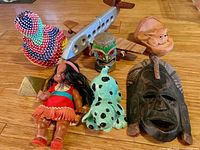 Overview of all eight items on wood floor