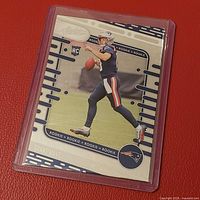 Front of 2024 Panini Absolute Drake Maye rookie card in toploader