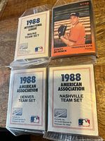 Front view of four team sets showing titles and one visible Frederick Keys card