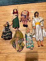 Group shot of all six dolls